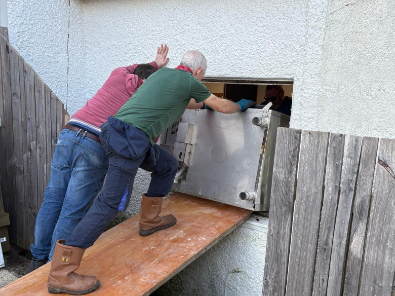 Volunteers fitting the kitchen