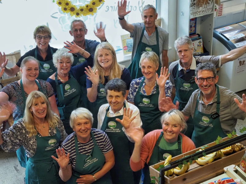 Community shop members A group of community shop members smile to the camera